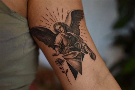 female angel tattoo|feminine angel tattoo.